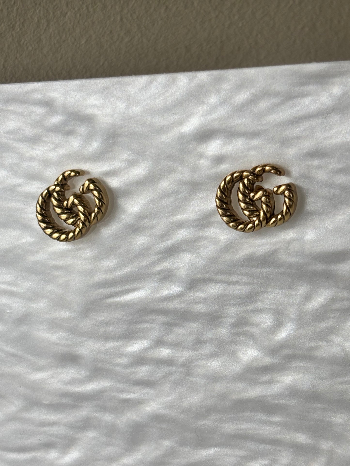 Boucles d’oreille double g