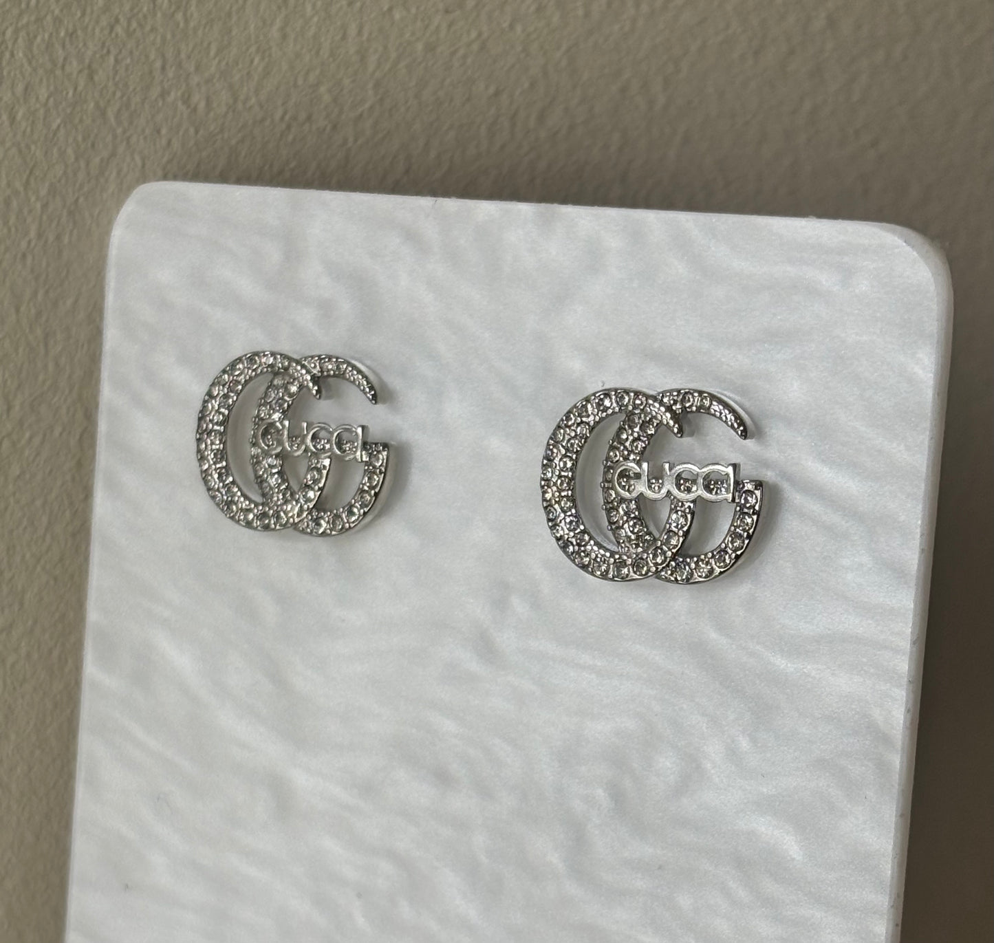 Boucles d’oreille double g silver