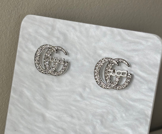 Boucles d’oreille double g silver