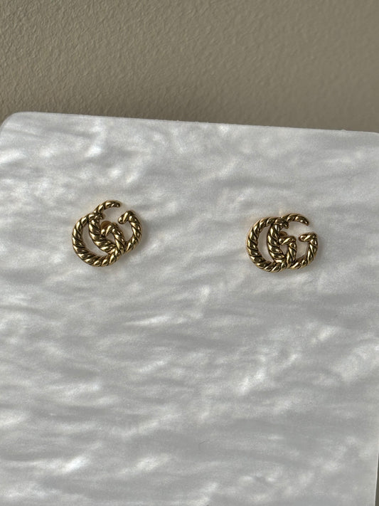 Boucles d’oreille double g